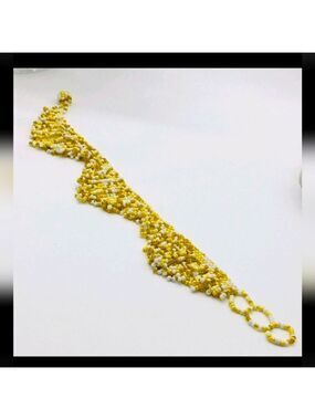 Elegant Yellow and White Beaded Bracelet